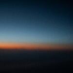 early morning dawn sky in soft indigo and gold